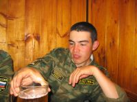 Снял погоны и петлицы и успел уже напиться...